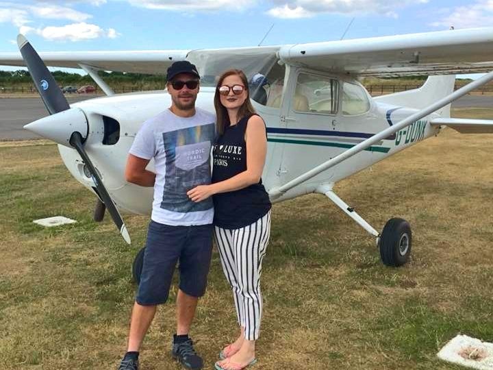 Happy Couple on Cost Shared Flight